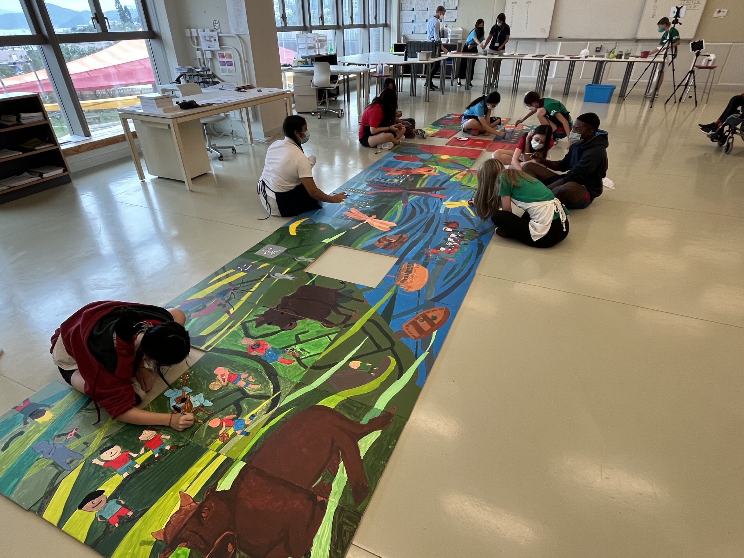 ‘A Dragonfly’s Journey’ community mural putting together